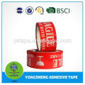 White base with red words printed packing tape